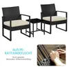 A set of outdoor furniture including two chairs and a small table, with a close-up of hands weaving rattan. Podgląd zdjęcia produktu