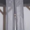 A close-up view of a zipper on a gray mesh gazebo or tent. Náhled obrázku produktu