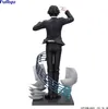 A figurine of a character from Hunter x Hunter, Chrollo Lucilfer, in a black suit, standing on a base with abstract elements. Produktbild-Vorschau