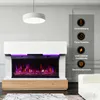 A modern electric fireplace with a white mantel and a wood-tone base, featuring a vibrant LED flame effect. The image is set in a living room with a white sofa and a pendant light. Anteprima dell’immagine prodotto