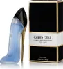 A perfume bottle shaped like a high-heeled shoe and its packaging. Podgląd zdjęcia produktu