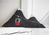 A pillow shaped like mountains with a gondola. Produktbild-Vorschau
