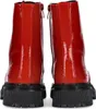 A pair of red patent leather boots with black soles. Produktbild-Vorschau