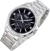 A close-up studio shot of a men's Casio watch with a black dial and silver metal band. Produktbild-Vorschau