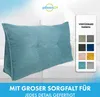A teal corduroy wedge pillow is shown on a white sofa, with a panel on the right displaying various available colors. Podgląd zdjęcia produktu