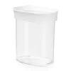 A clear studio shot of an empty transparent storage container with a white lid. Voir les images du produit