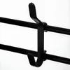 A close-up of a black plastic hook attached to two black horizontal bars. Produktbild-Vorschau