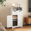 A white storage cabinet with doors and drawers is shown in a room setting, with decorative items on top and folded textiles inside. Produktbild-Vorschau