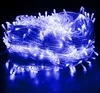 A tangled bundle of blue LED string lights on a dark background. Produktbild-Vorschau