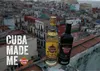 Two bottles of Havana Club rum are placed on a ledge overlooking a city skyline. Produktbild-Vorschau
