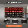 A wall-mounted storage system with red and black bins filled with various items, displayed in a garage or workshop setting. Below the main storage unit, three separate bins are shown in detail. Anteprima dell’immagine prodotto