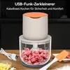 A USB-powered mini food processor filled with minced meat, shown on a wooden table with a USB cable and a spatula. Produktbild-Vorschau