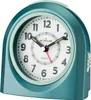 A close-up studio shot of a teal analog alarm clock with a white face. Produktbild-Vorschau