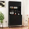 A black kitchen cabinet with a coffee machine, wine bottle, and glasses on display. Náhled obrázku produktu
