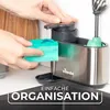 A person is using a Vileda dish soap dispenser and organizer next to a sink. Anteprima dell’immagine prodotto