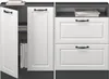 A set of white cabinet doors and drawers with black handles, set against a dark gray background. Voir les images du produit
