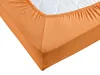 A close-up view of an orange fitted sheet on a mattress. Produktbild-Vorschau