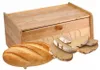 A wooden bread box with a loaf of bread and slices of bread in front of it. Produktbild-Vorschau