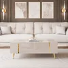 A modern living room scene with a couch and coffee table. Produktbild-Vorschau