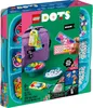 The image shows the packaging of a LEGO DOTS Bag Tags Mega Pack, featuring a purple backpack adorned with colorful LEGO DOTS bag tags. Various LEGO DOTS pieces and examples of personalized tags are also displayed. Produktbild-Vorschau
