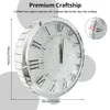 A close-up of a silver wall clock with Roman numerals, featuring text overlays describing its craftsmanship and dimensions. Podgląd zdjęcia produktu