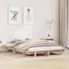 A minimalist bedroom with a wooden bed frame and bedding. Produktbild-Vorschau