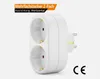 A white double electrical outlet adapter with a European plug. Produktbild-Vorschau