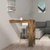 A bar table and stool are set up in a living room area next to a sofa. Náhľad obrázku produktu