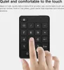 A hand is shown pressing a button on a black numeric keypad. Podgląd zdjęcia produktu