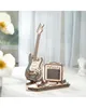 A wooden model of an electric guitar and amplifier on a stand. Produktbild-Vorschau