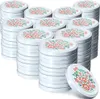 A stack of white jar lids with a floral folk art pattern. Anteprima dell’immagine prodotto