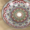 A close-up view of a decorative sink with a colorful mandala pattern. Náhled obrázku produktu