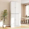 A tall white cabinet with four doors stands in a room next to a potted plant. A dining table is visible in the background. Produktbild-Vorschau