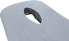 A close-up view of a light gray massage table cover with a face hole. Produktbild-Vorschau