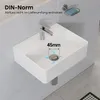 A white ceramic wall-mounted sink with a chrome faucet and a diagram indicating a 45mm drain size. Anteprima dell’immagine prodotto