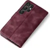 A burgundy flip case for a smartphone is shown from a diagonal angle against a white background. Produktbild-Vorschau