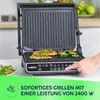 A close-up shot of an open electric grill with food cooking on it, with a hand pressing a button on the control panel. A salad is visible in the background. Produktbild-Vorschau