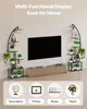 A living room scene with two multi-tiered plant stands flanking a television, with icons representing different uses for the stands at the bottom. Voir les images du produit