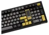 A close-up, angled view of a black and gold mechanical keyboard. Produktbild-Vorschau