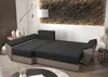 A sectional sofa is shown in a living room setting with a large textured wall art behind it. Voir les images du produit