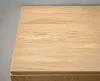 A close-up view of the top surface of a wooden sideboard. Produktbild-Vorschau