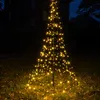 A decorative LED Christmas tree illuminated at night in an outdoor setting. Produktbild-Vorschau
