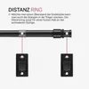 Diagram showing a curtain rod with a distance ring and mounting brackets. Produktbild-Vorschau