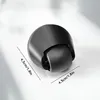 A close-up shot of a black robot vacuum cleaner wheel with dimensions indicated by lines and text. Produktbild-Vorschau