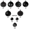 A collection of black Christmas ornaments of various sizes and textures, arranged in rows. Podgląd zdjęcia produktu