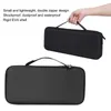 A hand holds a black carrying case with a handle. Below it is another black carrying case. Podgląd zdjęcia produktu