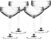 Four clear champagne coupe glasses with vertical ribbed detailing are arranged on a white background. Produktbild-Vorschau