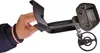 A hand holding a metal detector. Náhľad obrázku produktu