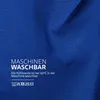 Close-up of blue fabric with text and laundry symbols. Produktbild-Vorschau