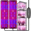Two LED grow light panels and a four-tier shelving unit with plants under grow lights. Anteprima dell’immagine prodotto